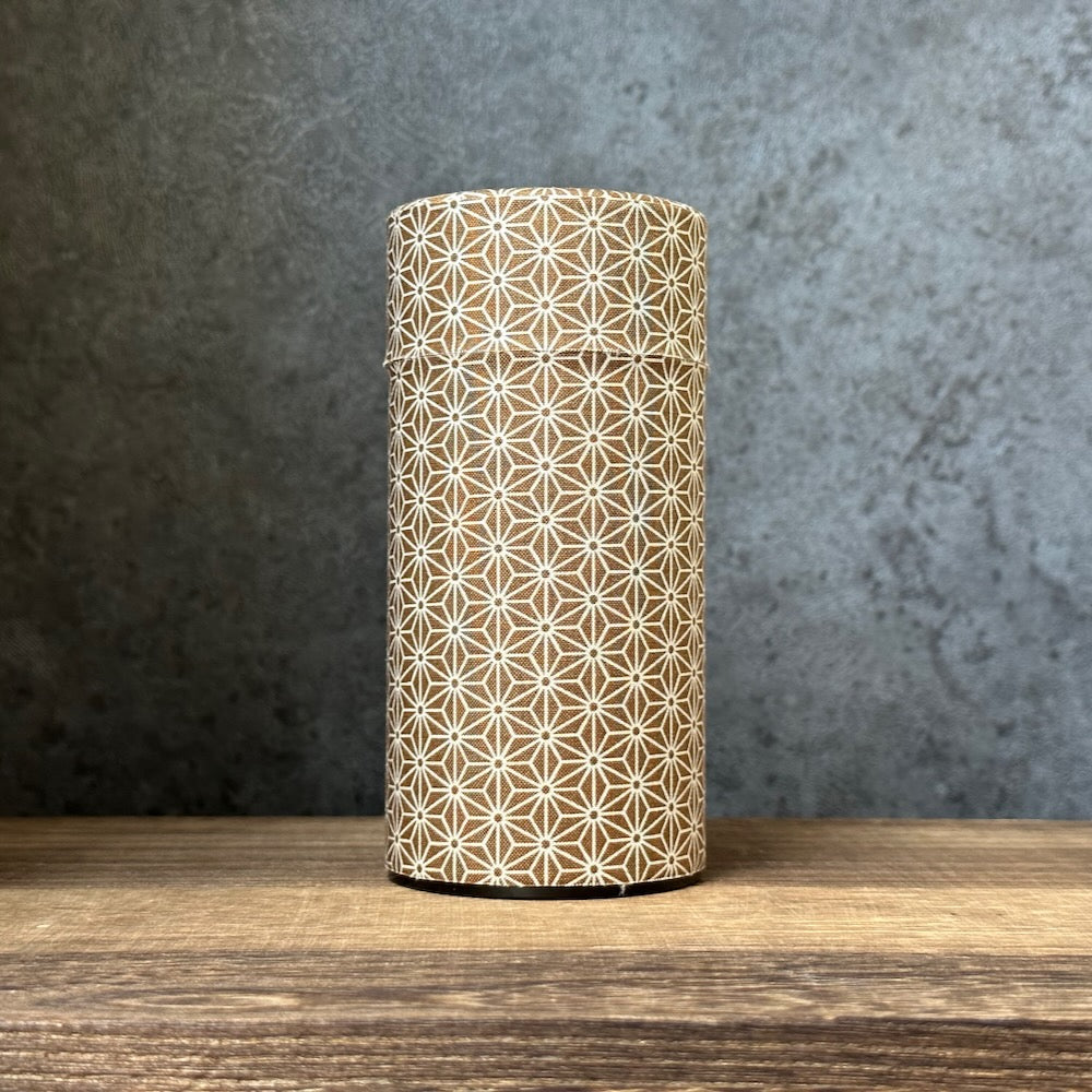 Okumura Seikan: Tea Canister, Fabric (size for 175g sencha), Design: Asanoha Hemp Leaves Brown