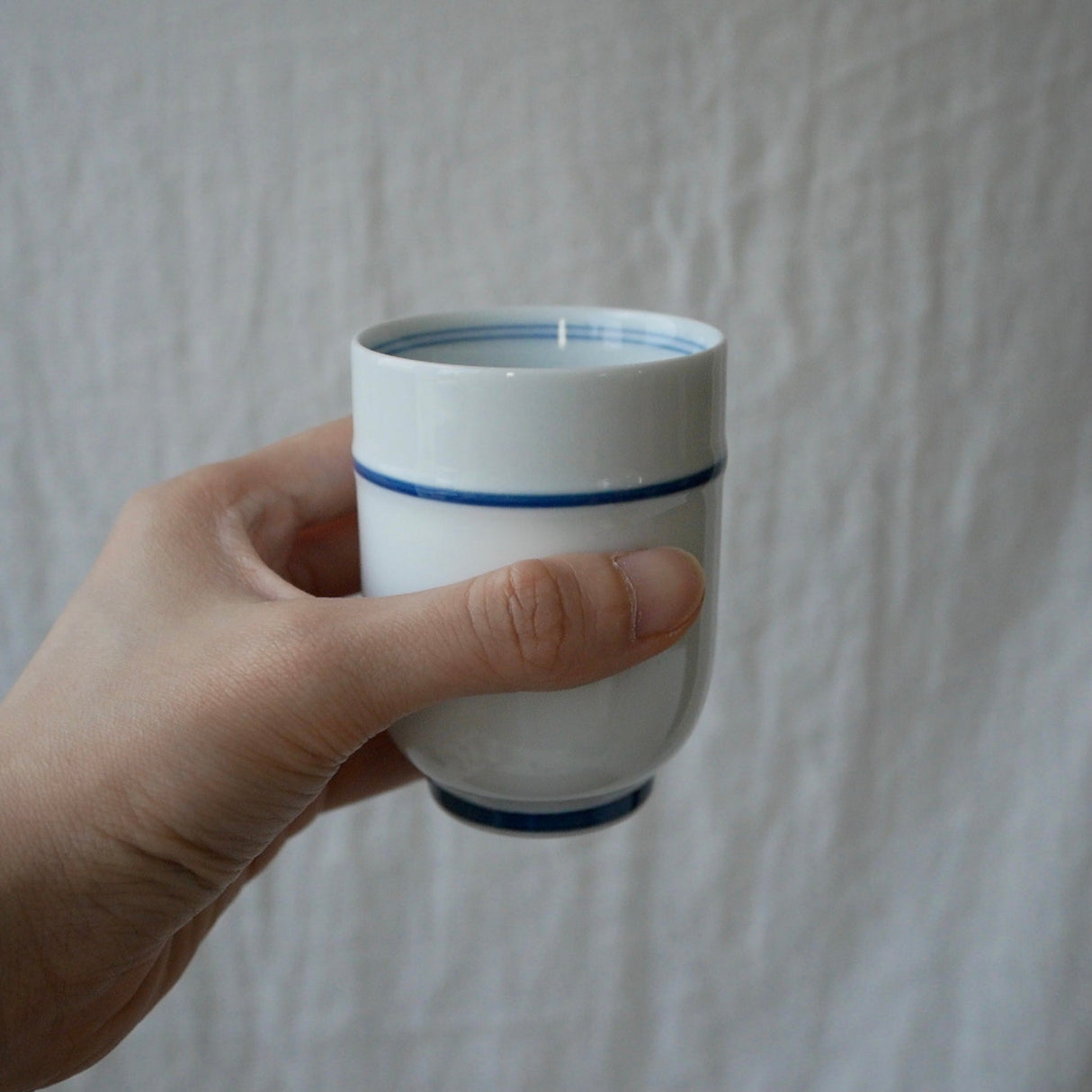 Saikai Ceramics: Blue Trim, White Porcelain Yunomi Tea Cup with Blue Accents 150 ml - Yunomi.life